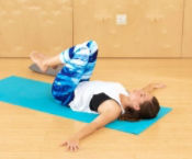 Woman practicing Yoga at home