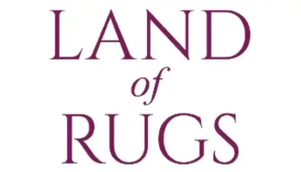 VoucherBuddy.co.uk Land of Rugs discount code logo in purple text on a white background.